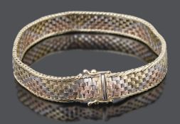 A contemporary 9ct tricolour gold textured brick link bracelet