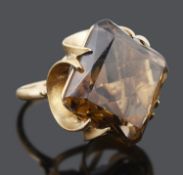 A Continental golden yellow gem set dress ring