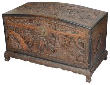 An early 20th c. Chinese carved teak domed blanket chest