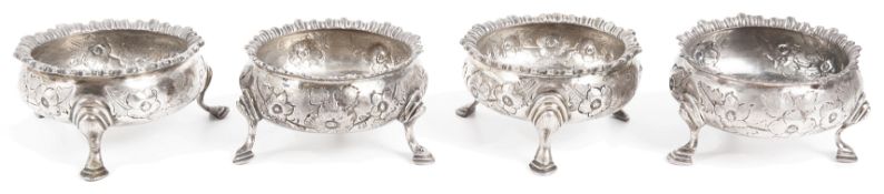 A matched set of four George III silver cauldron salts,