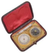 A 19th century brass Fr. pocket barometer, thermometer and compass travelling compendium