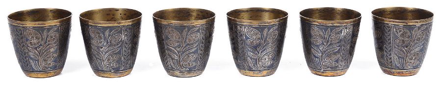 A contemporary set of six Russian .875 silver gilt and niello vodka tots with an associated tray