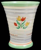 A Clarice Cliff pottery trumpet shaped ribbed 'Tulip' pattern vase