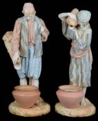 A pair of Royal Worcester porcelain figures of water carriers, c1894 and 1895 (2)