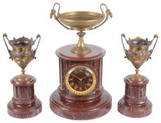 A late 19th century French three piece red marble and gilt metal clock garniture (3)