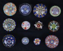 Twelve millefiore glass paperweights (12)