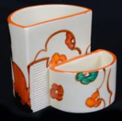 A Clarice Cliff Fantasque Farmhouse pattern cigarette and match holder