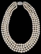 An impressive four row cultured pearl necklace with diamond set clasp
