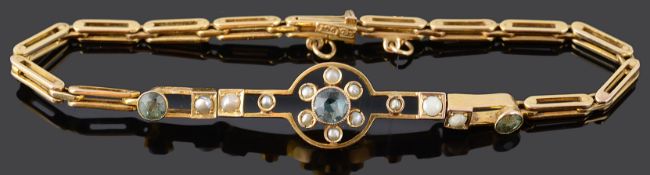 A delicate Edwardian aquamarine and seed pearl set cluster bracelet