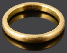 A 22ct gold plain polished wedding band