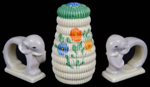 A rare pair of Art Deco Clarice Cliff napkin rings; one other (3)