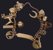 A delicate 9ct gold curb link charm identity bracelet
