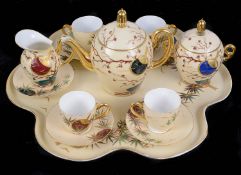 An early 20th century Limoges porcelain cabaret set