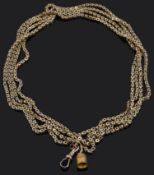 A Victorian square pierced link yellow metal longuard chain