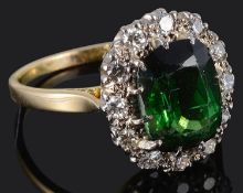 A tourmaline and diamond set cluster ring
