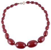 A single row cherry amber bead necklace