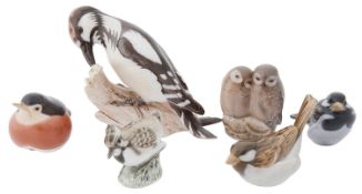 A collection of Royal Copenhagen and Bing & Grondahl porcelain bird figurines