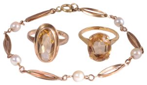 A pearl and 9ct gold delicate bracelet with two citrine rings