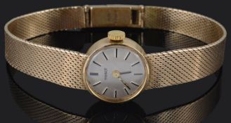 A ladies 1960s 9ct gold Tissot wristwatch and a 9ct gold Italian Indaerre belcher link bracelet