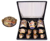 An early 20th century Japanese porcelain Camel China six setting coffee service