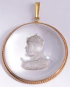 Contemporary 18ct gold mounted carved rock crystal cabochon pendant