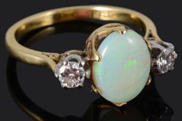 A Continental three stone opal and diamond set ring