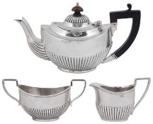 An Edward VII matched three piece silver bachelors tea service