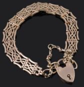 An early 20th Century rose gold coloured gate bracelet