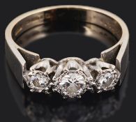 A three stone diamond set ring