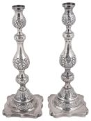 A pair of George V silver Sabbath candlesticks