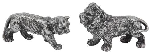 A pair of Edward VII naturalistically cast figures of a standing lion and lioness