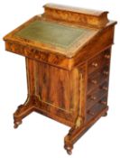 A Victorian burr walnut davenport desk
