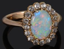 An attractive 15ct gold Edwardian opal and diamond set cluster ring