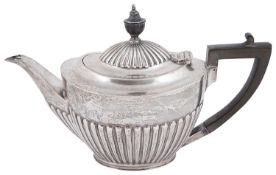 A late Victorian silver presentation teapot