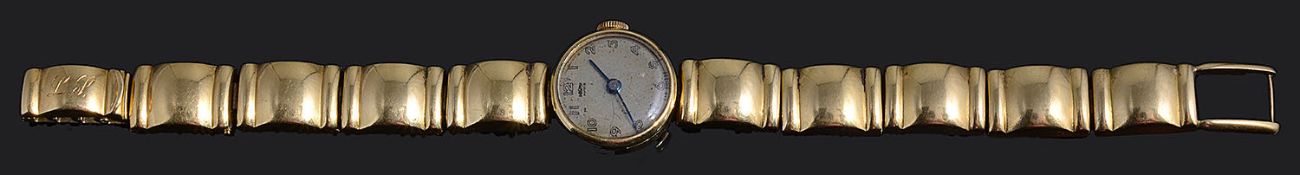 A ladies 18K gold wristwatch