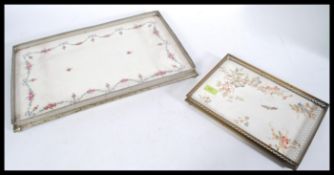 Two 20th Century decorative trays having ceramic bases with floral decoration and pierced decoration