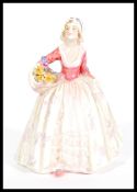 A Royal Doulton figure entitled Janet, model number HN1652 designed by L Harridene. Stamped to base.
