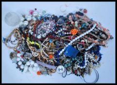 A selection of vintage costume jewellery to include a good selection of beaded necklaces,