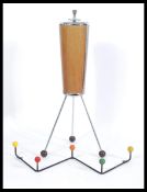 A vintage retro 20th century sputnik atomic floor standing ashtray of rocket shape having chrome