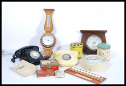 A collection of vintage items to include vintage GEC black bakelite phone, Northern Telecom circular