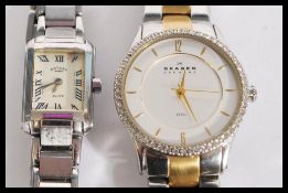 Two ladies watches to include a Skagen Denmark wrist watch having a white enamelled face with gold