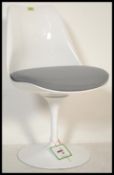 After Eero Saarinen - Tulip Chair - A single contemporary tulip style swivel chair raised on the
