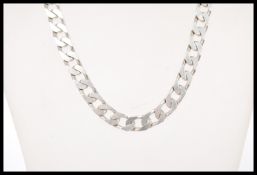 A stamped 925 silver curb link chain necklace with a lobster clasp. Total weight 80.9g.