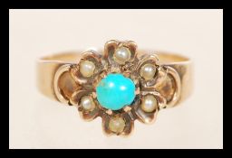 A Victorian gold turquoise and seed pearl flower cluster ring. Unmarked tests gold. Size K.5. Weight