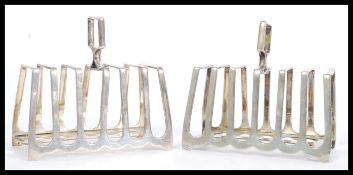 A pair of early 20th Century silver plated toast racks by Howson Brothers of graduating