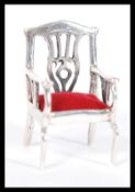 A sterling silver novelty dolls house furniture pincushion in the form of a splat back carver
