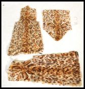 Three sheep skin rugs / throws being printed with rosettes to resemble wild cat skins.