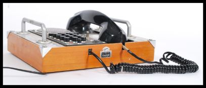 A retro style mid century telephone - classic St Louis Field phone Mark 1 having a wood and