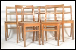 A set of 4 mid 20th century Industrial stacking school chairs. Squared legs united by upper