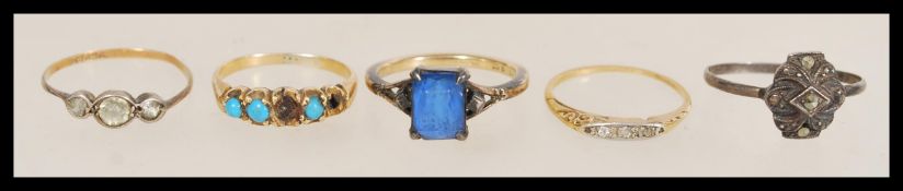 A selection of vintage rings to include a stamped 9ct gold and silver ring set with a square cut